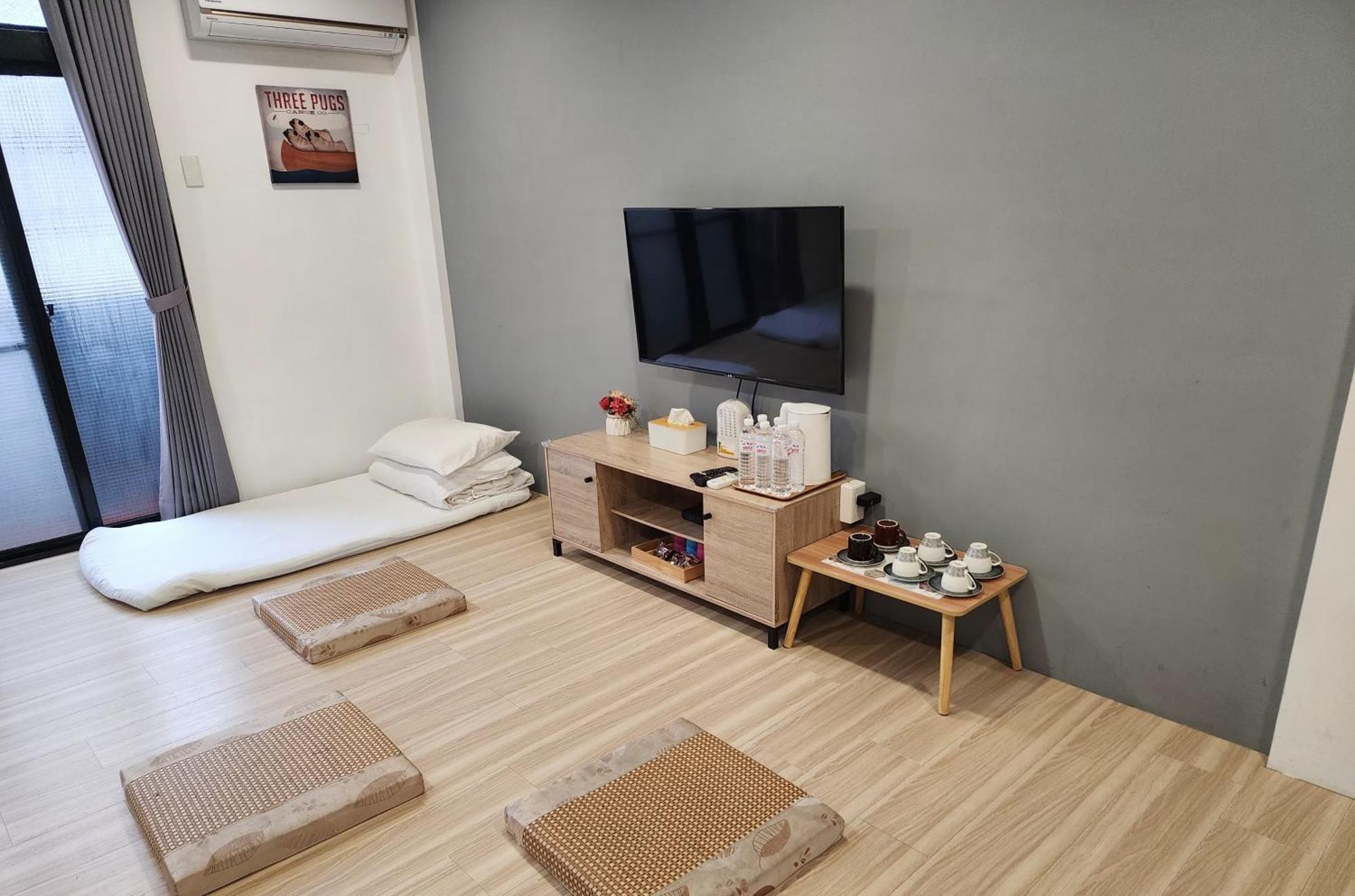 藏青民宿the Wind Guesthouse-Youth Inn Тайнань Номер фото